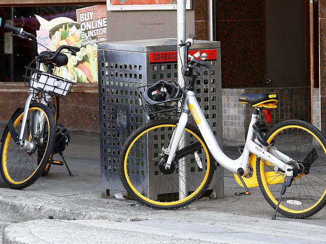 Hire bikes left on Coogee Bay Road near Coogee Beach. Picture: John Appleyard