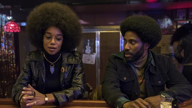 Laura Harrier as Patrice and John David Washington as Ron Stallworth in a scene from film BlacKkKlansman