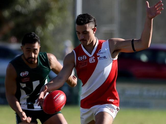 Glenroy's Alex Galie gets a kick away on Saturday. Picture: Mark Dadswell