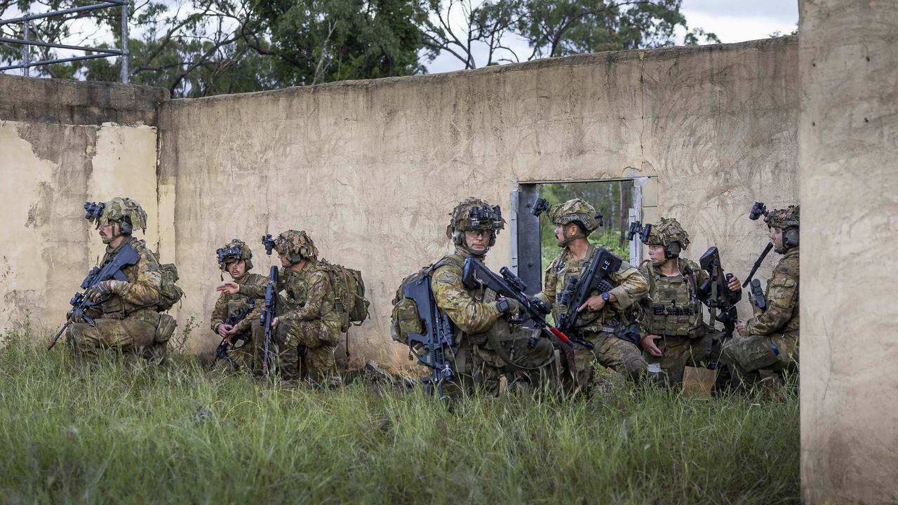 Exercise Brolga Run at the Townsville Field Training Area at High Range. Sappers from 3rd Combat Engineer Regiment conduct explosive breaching of a compound before clearing it, with a casualty scenario. PNGDF senior soldiers assist in running the activity. Picture: Supplied