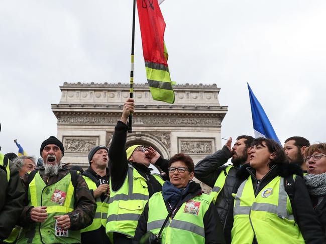 "Yellow Vest" (Gilet Jaune) protesters take part in an anti-government demonstration in front of the Arc de Triomphe in Paris in March. Picture: AFP