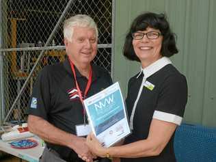 GIVING BACK: Murray Smith of the Mens Shed and Kim Harrington, Associate Vice Chancellor for Rockhampton celebrate Volunteers Week. Picture: Jann Houley