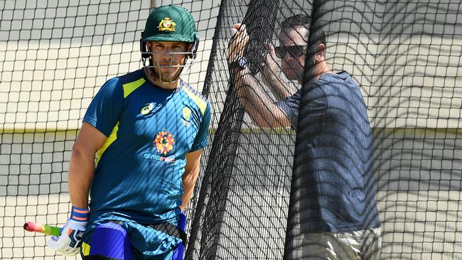 Opening batsman Aaron Finch consults with former captain Ricky Ponting at Optus Stadium. Picture: AAP