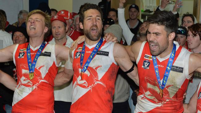 Troy Schwarze (middle) is back in the coaches box. Picture: AAP/ Chris Eastman