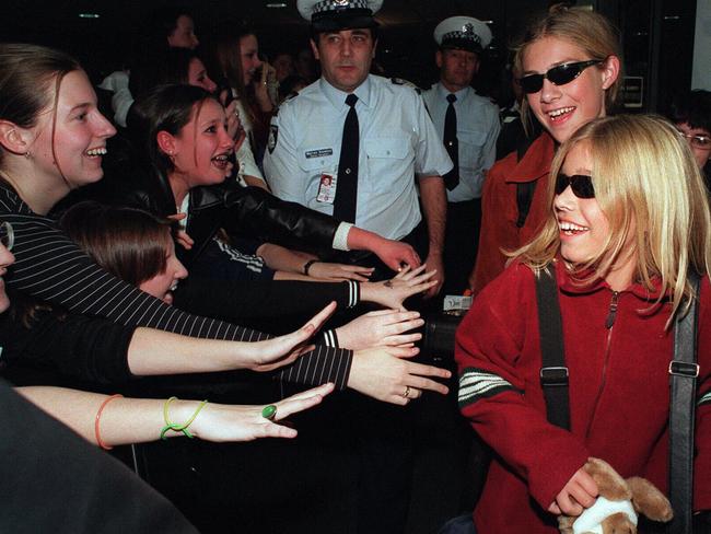 Plenty of screaming fans were waiting to greet Hanson when they touched down in Australia in 1997.