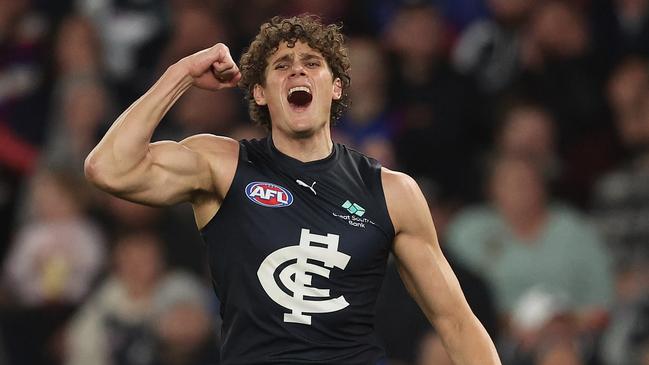 MELBOURNE, AUSTRALIA - JULY 13: Charlie Curnow of the Blues celebrates after scoring a goal during the round 18 AFL match between Western Bulldogs and Carlton Blues at Marvel Stadium, on July 13, 2024, in Melbourne, Australia. (Photo by Robert Cianflone/Getty Images)