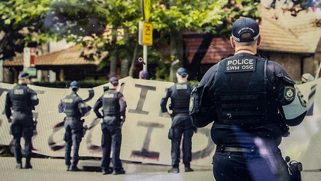 Protesters are seen facing off with police in Sydney as the King and Queen attend a church service in North Sydney while on their royal tour. Picture: NewsWire / Monique Harmer