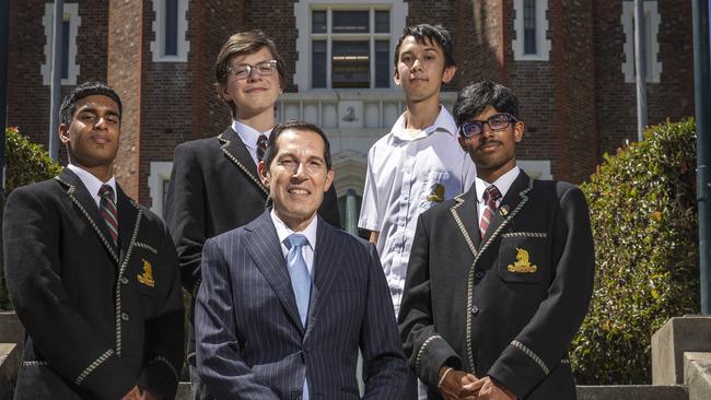 Melbourne High School principal Anthony Mordini is joined by students Sandush Peiris, Louis Rainsford, Gabriel Tran and Shannon Rs. Picture: Jake Nowakowski