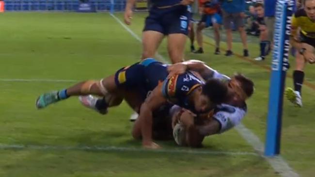 Cowboys winger Kyle Feldt tackles Brian Kelly to save a try. Picture: Fox Sports