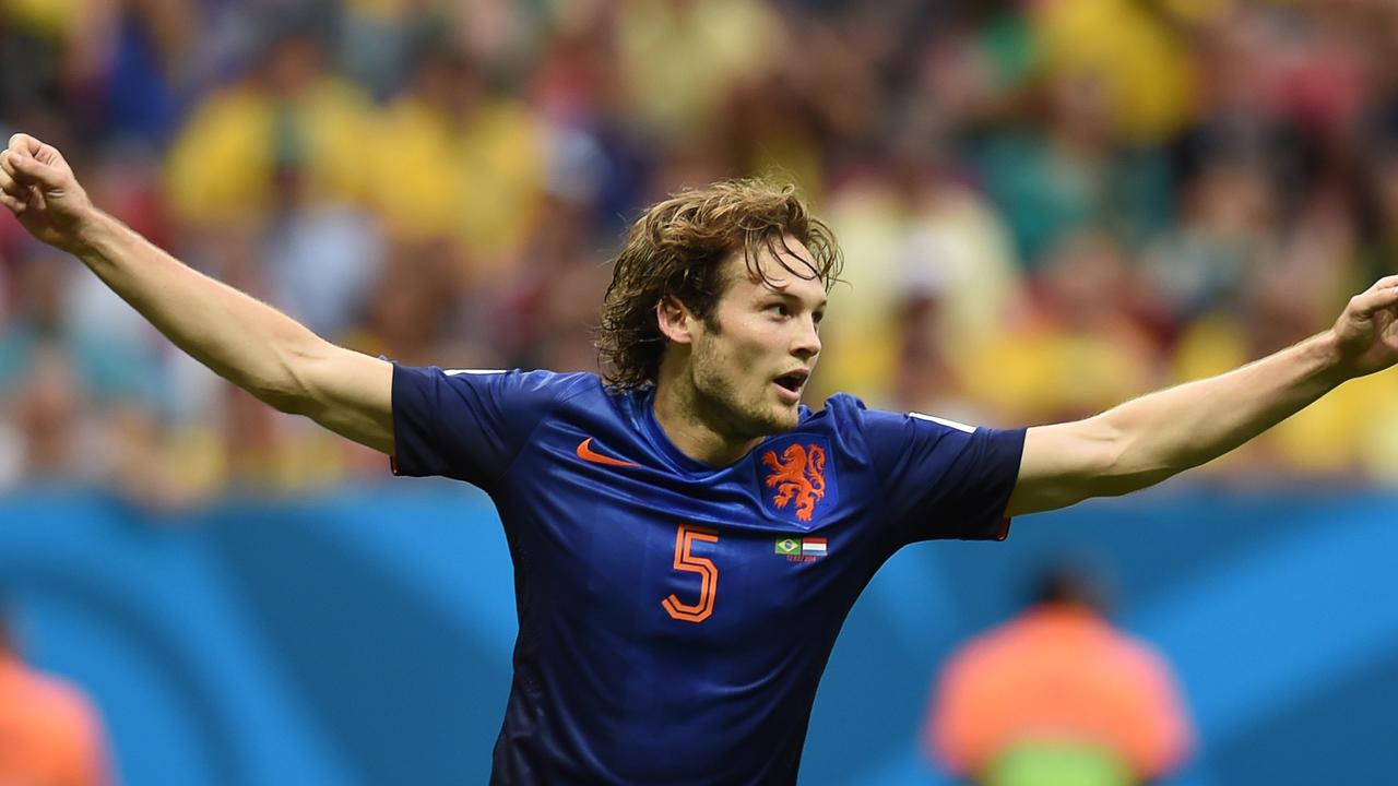 TOPSHOTS Netherlands' defender Daley Blind celebrates after scoring a goal during the third place play-off football match between Brazil and Netherlands during the 2014 FIFA World Cup at the National Stadium in Brasilia on July 12, 2014. AFP PHOTO / VANDERLEI ALMEIDA