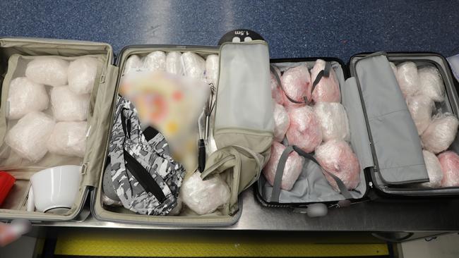 ABF officers seized a total of 26kg of methamphetamine after finding more than 20 packages in the man’s two suitcases. Picture: ABF.