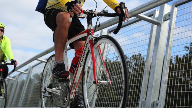 Police are searching for a driver of a grey or white Toyota Corolla at Lidcombe after a cyclist died in a hit and run incident on Tuesday.