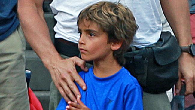 BOSTON - AUGUST 17: Actor Matthew McConaughey stands for the national anthem at the Red Sox game at Fenway Park on August 17, 2014. The Boston Red Sox took on the Houston Astros in Game 4 of a four-game series at Fenway Park. (Photo by Jim Davis/The Boston Globe via Getty Images)