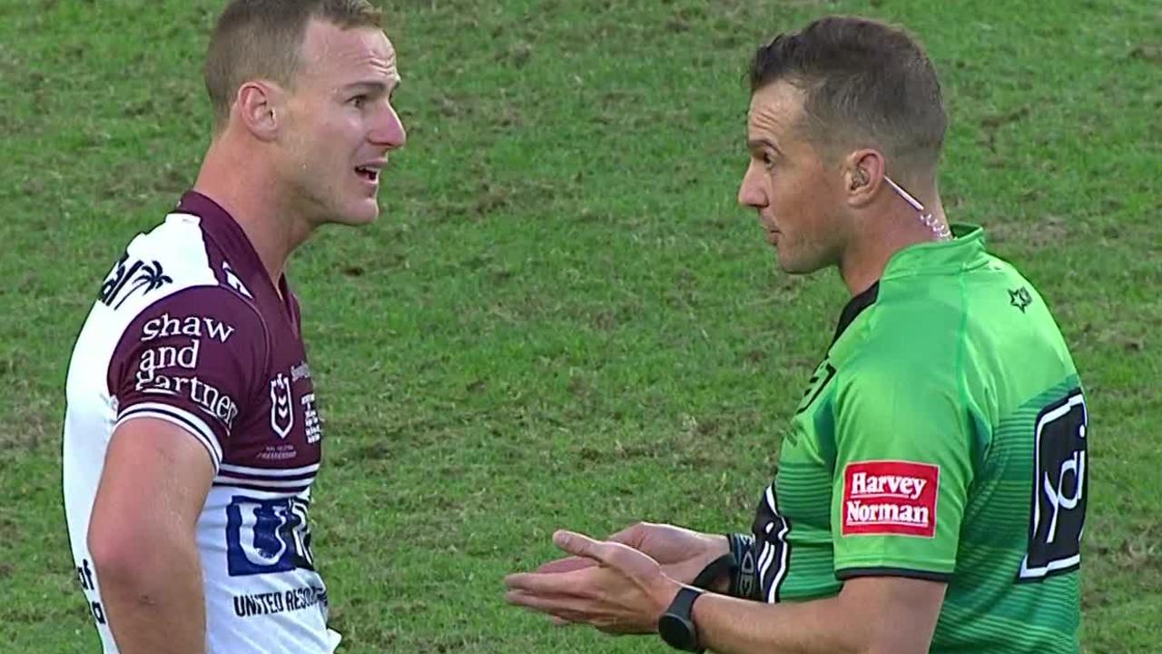 Daly Cherry-Evans and referee Grant Atkins exchange words.