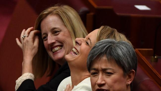 Senator Katy Gallagher (left) Senator Kristina Keneally and Senator Penny Wong are seen prior to the Incoming Governor-General of the Commonwealth of Australia David Hurley's swearing in ceremony in the Senate at Australian Parliament House, in Canberra, Monday, July 1, 2019. (AAP Image/Sam Mooy)