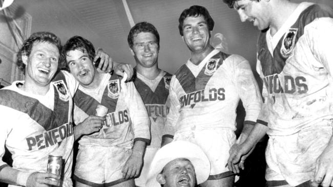 Morris (second left) celebrates the Dragons’ 1979 premiership win.