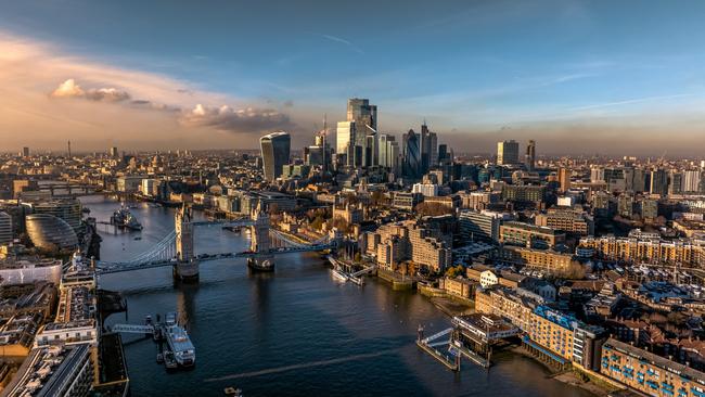 The Tower bridge, Business Center and City of London on a sunny day.