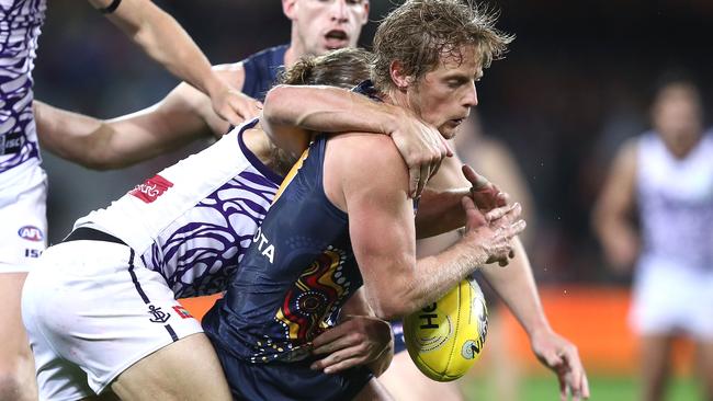 Rory Sloane is tackled high during the clash against Fremantle.