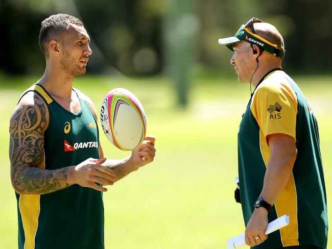 Reds star Quade Cooper talks with Andy Friend ahead of the 2017 Sydney 7s. Picture Gregg Porteous