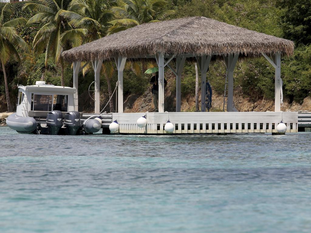 Armed guards and the sharp rocks that lie beneath the turquoise waters around his Caribbean island have long deterred boaters from the area, but curiosity has overcome concern ever since the financier apparently killed himself in jail as he awaited trial in New York on sex trafficking charges. Picture: Gabriel Lopez Albarran