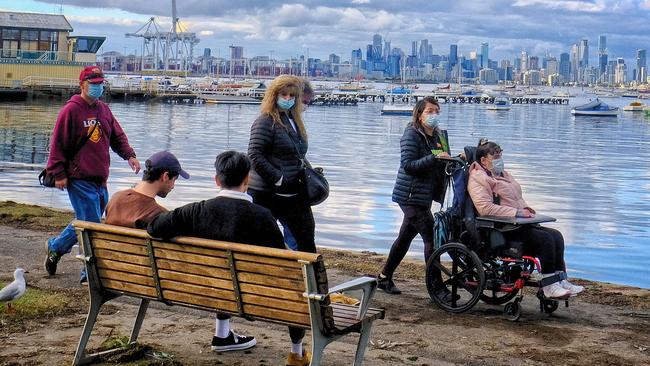 Walkers enjoying an outing at Williamstown over the long weekend. Picture: NCA NewsWire/Luis Ascui