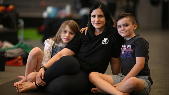 Lisa George, 47, with Fionnuala 7 and Patrick 9 in Petrie in northern Brisbane. Lisa suffered with chronic UTI for over 20 years and was diagnosed and started antibiotic treatment in 2018. Picture: Lyndon Mechielsen