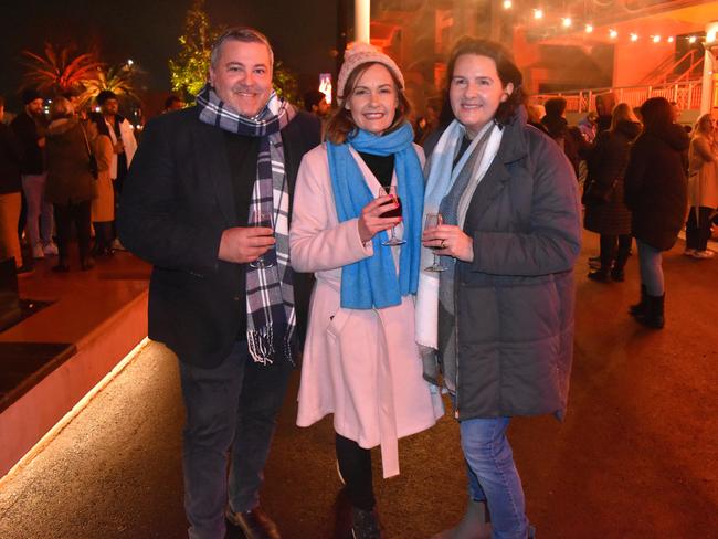 Jamie Arvanitakis, Genine Arvanitakis and Georgie Smith at the Whisky, Wine and Fire Festival 2024 at the Caulfield Racecourse. Picture: Jack Colantuono