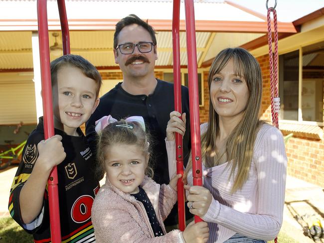 Tim and Samantha Randall with their children Michael -7 and Isabelle -4. They are selling their St Clair home and moving to Lake Macquarie. Picture: John Appleyard