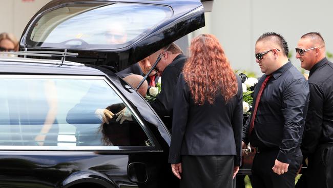 Friends and family attend the funeral of Shane Ross at Southport Church of Christ.