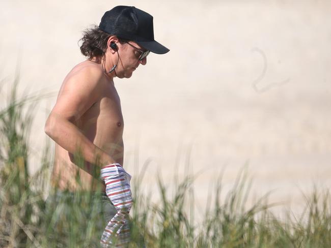 Chris Lilley, director, writer and star of a new Netflix comedy TV series filming on the Gold Coast, hit the beach at Mermaid on Saturday. Picture: Nathan Richter.