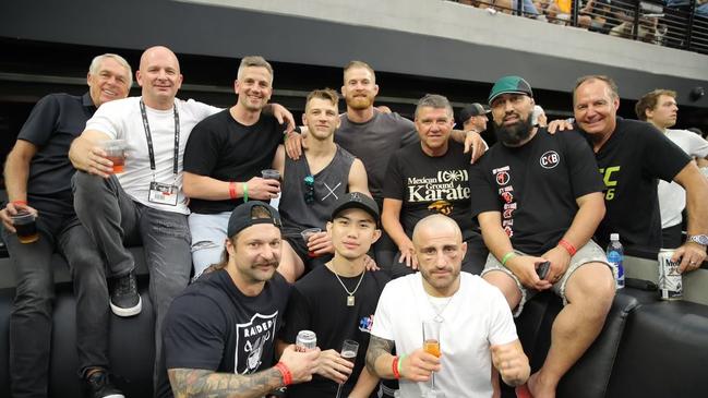 UFC champ Alex Volkanovski celebrates with his mates, including Dan Hooker, after UFC 266.