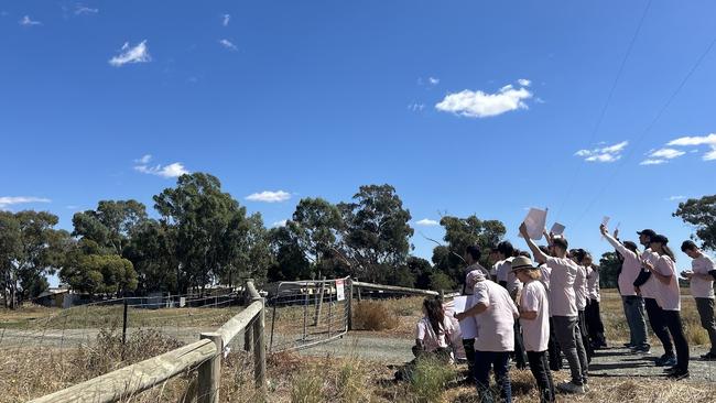 Protesters attempt to gain the attention of the piggery, to no avail. Picture: Oscar Jaeger