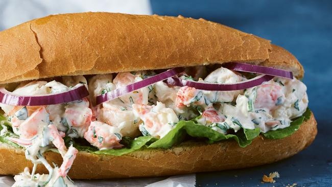 Anthony Yotis and Laura De Florio Yotis perfect the prawn roll.