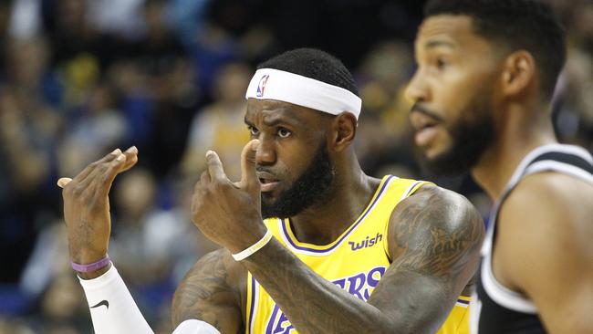 Los Angeles Lakers star Lebron James gestures during a preseason NBA game against the Brooklyn Nets in Shanghai, China. Picture: AP