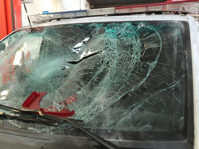 The smashed windscreen of a police car. Picture: David Crosling