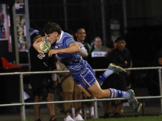 Patrician Brothers, Fairfield winger Jesse Williams crosses for a try in their opening round win over Matraville Sports High. Photo: Tim Pascoe