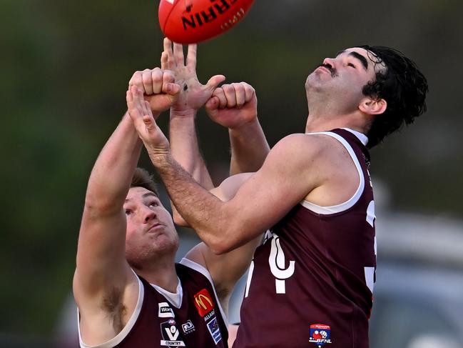 BFL: Melton’s Blake Souter marks over his own teammate. Picture: Andy Brownbill