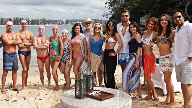 The Bold and the Beautiful stars with the Manly Bold and Beautiful swimmers before going on set at Shelly Beach, Manly. Picture: Adam Yip/ The Manly Daily