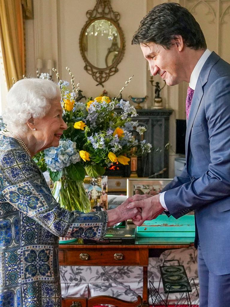 Queen Elizabeth II shakes hands with Canadian Prime Minister Justin Trudeau. Picture: AFP