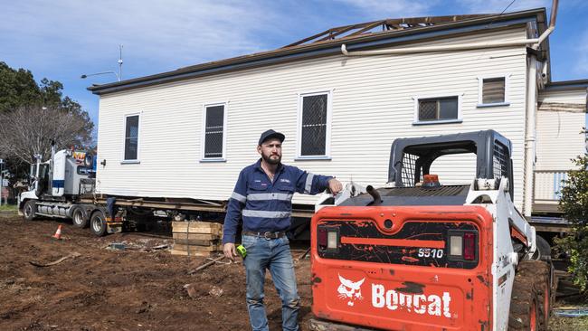 Tyson King of TJ King House Relocators is moving the houses on the corner of Jones and Ruthven Sts to make way for a McDonald's restaurant, Monday, July 26, 2021. Picture: Kevin Farmer