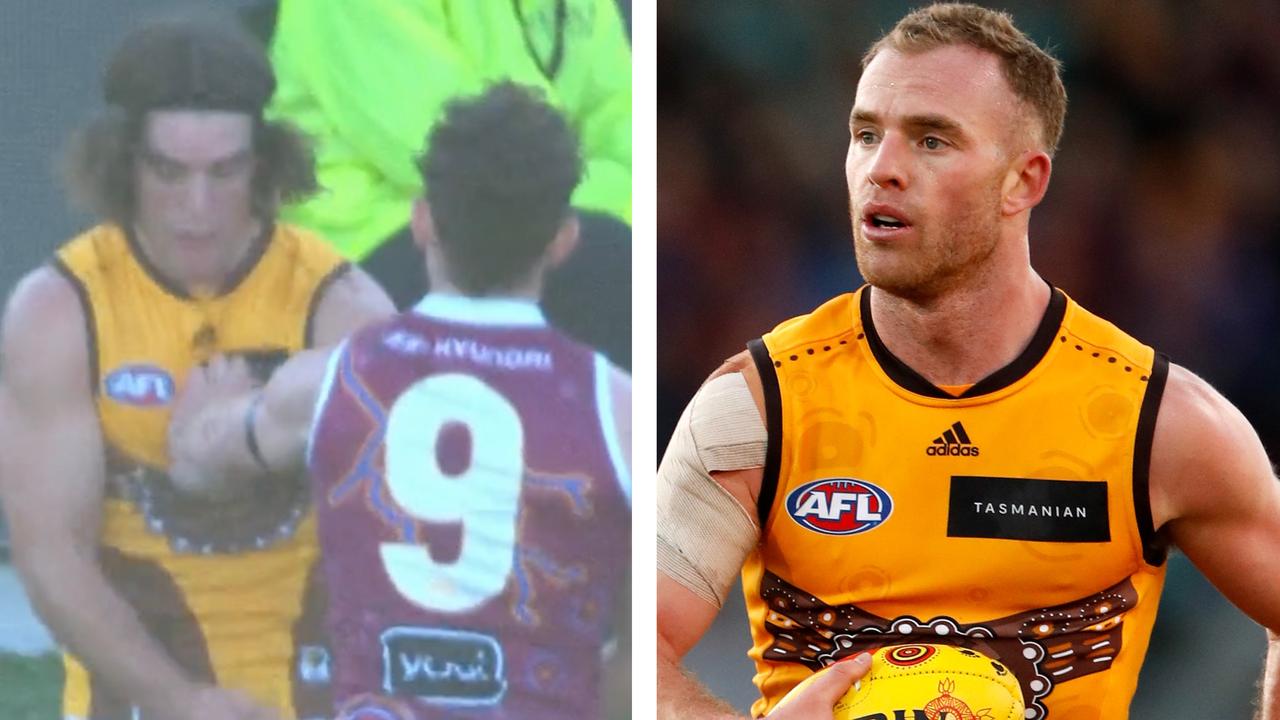 Hawthorn edged out Brisbane in a thrilling contest in Tasmania.