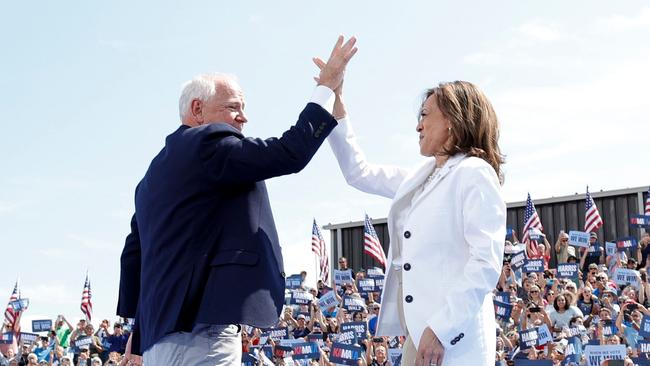 Kamala Harris and Tim Walz rally together as they begin their campaign for the presidential election in November. Picture: Kamil Krzaczynski/AFP