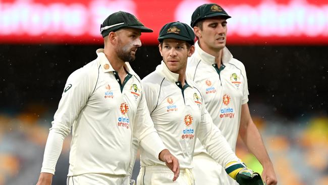 (Left to right) Nathan Lyon, Tim Paine and Pat Cummins during a Test match against India in 2021. Paine has staunchly defended Australian selectors. (Photo by Bradley Kanaris/Getty Images)