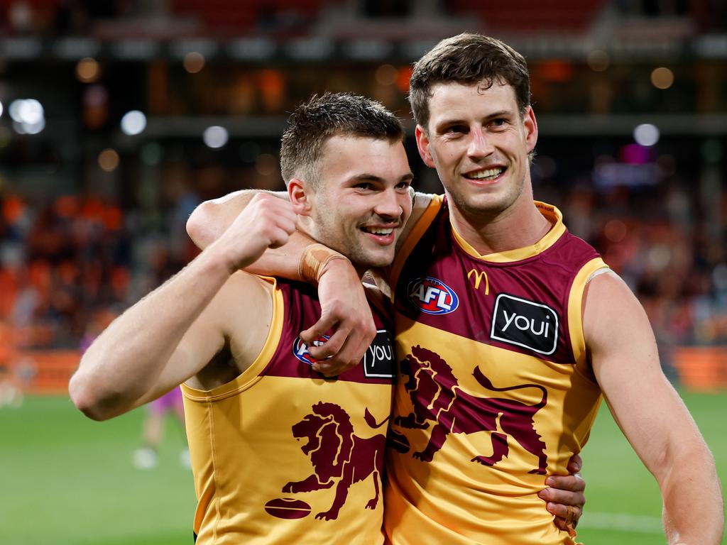 Darcy Wilmot and Jarrod Berry after the Lions’ semi-final win against GWS. Picture: Dylan Burns/AFL Photos via Getty Images.