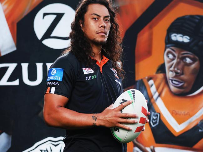 ON HOLD: EMBARGOED UNTIL TUESDAY 6PM: For the The Daily Telegraph 14.12.2024 Jarome Luai pictured in front of the new sponsors mural. Zurich. Wests Tigers members only training session at Zurich Centre, Concord.   Picture: Rohan Kelly