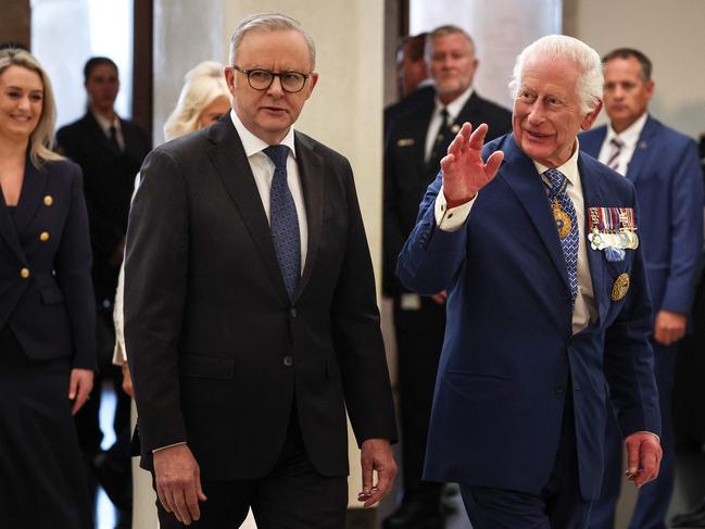 CANBERRA, AUSTRALIA - NewsWire Photos - 21 OCTOBER, 2024:  Britain's King Charles III (front R) waves beside Australia's Prime Minister Anthony Albanese as they enter Parliament House in Canberra on October 21, 2024, during a six-day royal visit to Sydney and Canberra. Picture: NewsWire / POOL / David Gray