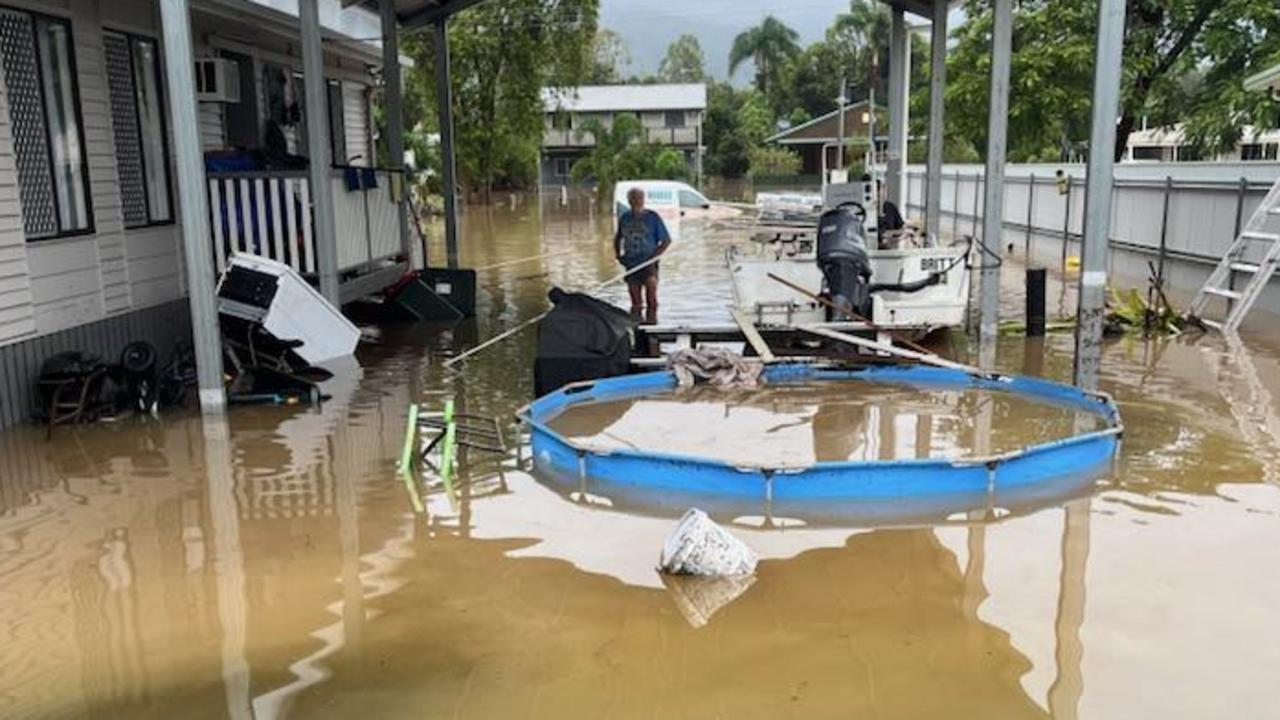 A backyard above ground swimming pool is inundated in Cardwell.