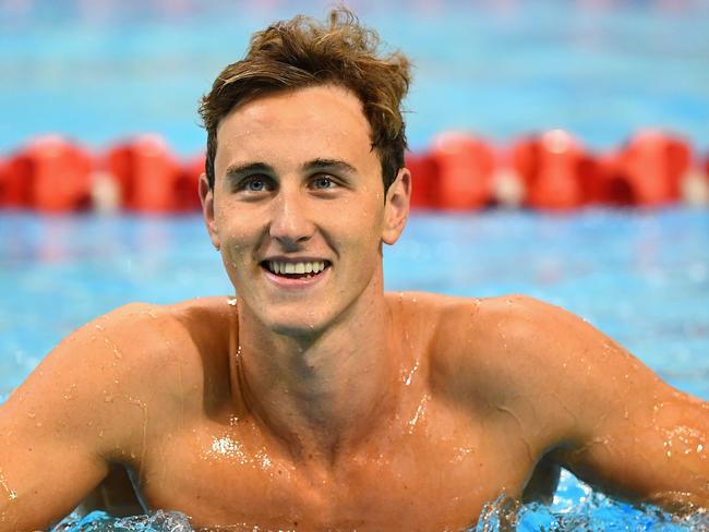 Cameron McEvoy is all smiles after winning the 50m freestyle at the Olympic swimming trials in Adelaide.