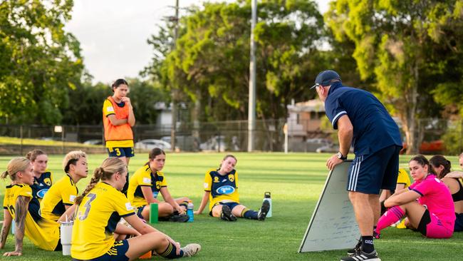 Gold Coast United coach Craig Midgley talks tactics with his team. Picture: Tim Martorana – TMP Media