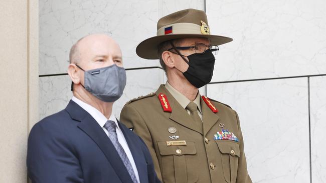 ADF General Angus Campbell and the Secretary of Defence Greg Moriarty joined the PM at the press conference. Picture: Newswire/Gary Ramage